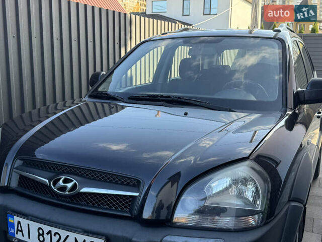 Чорний Хендай Туксон, об'ємом двигуна 1.98 л та пробігом 200 тис. км за 8200 $, фото 1 на Automoto.ua