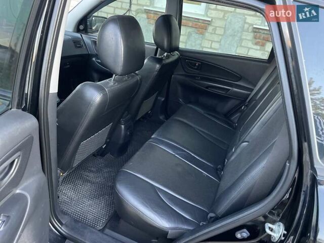 Чорний Хендай Туксон, об'ємом двигуна 2.66 л та пробігом 177 тис. км за 8800 $, фото 7 на Automoto.ua