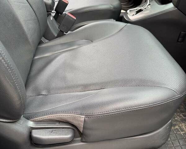 Черный Хендай Туксон, объемом двигателя 2 л и пробегом 282 тыс. км за 8700 $, фото 15 на Automoto.ua