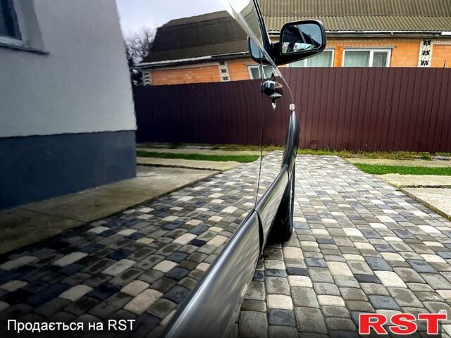 Чорний Хендай Туксон, об'ємом двигуна 2 л та пробігом 200 тис. км за 8499 $, фото 6 на Automoto.ua