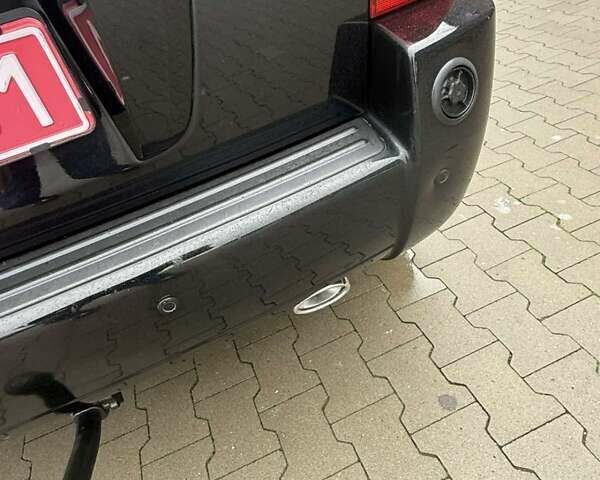 Черный Хендай Туксон, объемом двигателя 2 л и пробегом 237 тыс. км за 8350 $, фото 2 на Automoto.ua