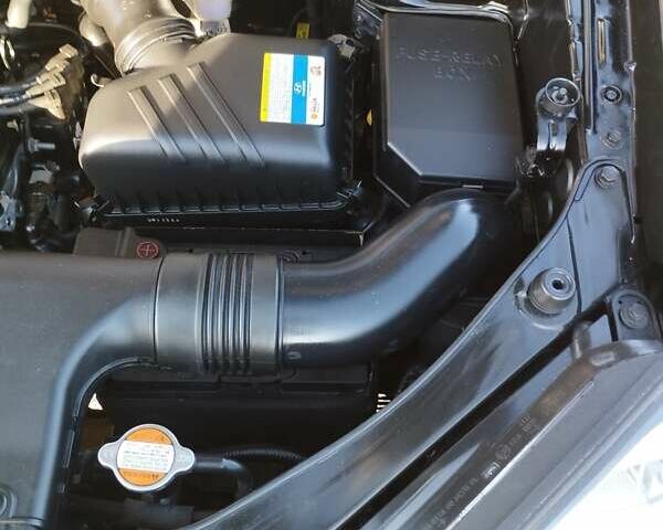 Черный Хендай Туксон, объемом двигателя 1.99 л и пробегом 159 тыс. км за 9700 $, фото 9 на Automoto.ua