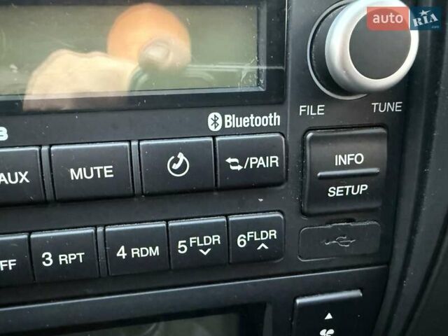 Черный Хендай Туксон, объемом двигателя 2 л и пробегом 148 тыс. км за 8700 $, фото 28 на Automoto.ua