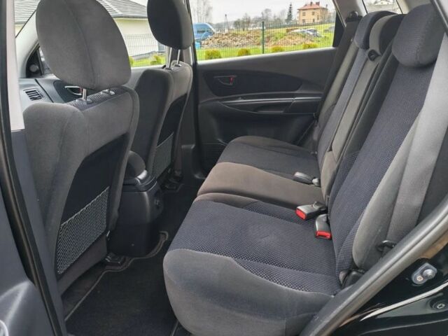 Чорний Хендай Туксон, об'ємом двигуна 1.98 л та пробігом 148 тис. км за 6199 $, фото 12 на Automoto.ua