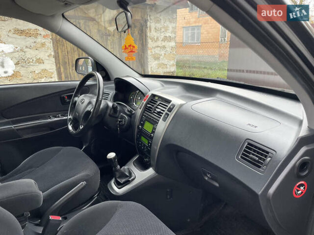 Чорний Хендай Туксон, об'ємом двигуна 2 л та пробігом 200 тис. км за 8450 $, фото 28 на Automoto.ua