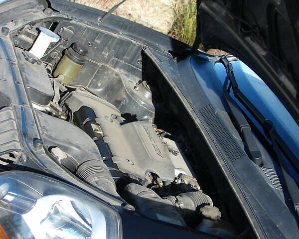 Черный Хендай Туксон, объемом двигателя 2 л и пробегом 162 тыс. км за 8200 $, фото 26 на Automoto.ua