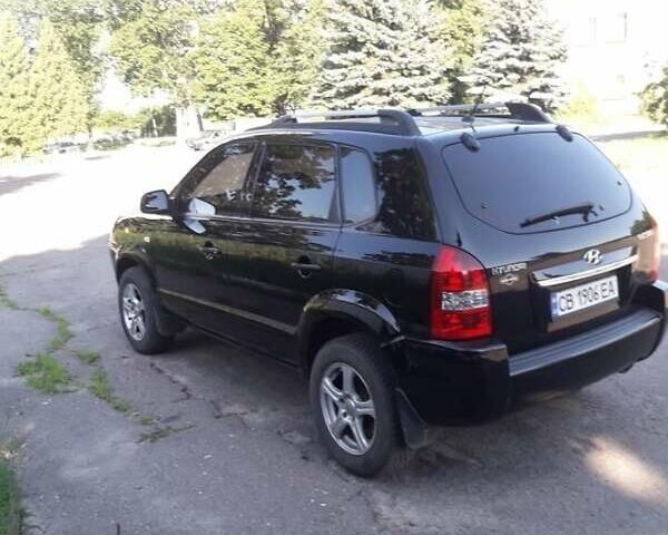 Черный Хендай Туксон, объемом двигателя 2 л и пробегом 220 тыс. км за 7500 $, фото 1 на Automoto.ua