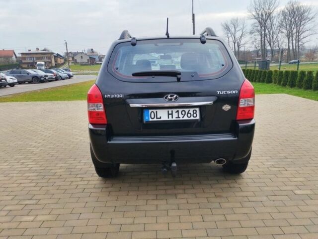 Чорний Хендай Туксон, об'ємом двигуна 1.98 л та пробігом 148 тис. км за 6199 $, фото 6 на Automoto.ua