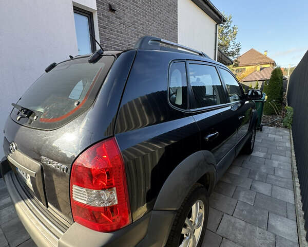 Чорний Хендай Туксон, об'ємом двигуна 1.98 л та пробігом 200 тис. км за 8200 $, фото 4 на Automoto.ua