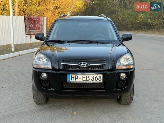 Черный Хендай Туксон, объемом двигателя 2 л и пробегом 148 тыс. км за 8700 $, фото 6 на Automoto.ua