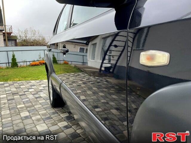 Чорний Хендай Туксон, об'ємом двигуна 2 л та пробігом 200 тис. км за 8499 $, фото 7 на Automoto.ua