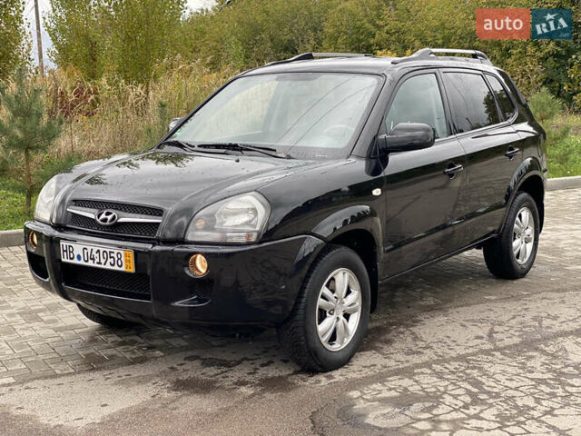Черный Хендай Туксон, объемом двигателя 2 л и пробегом 191 тыс. км за 7800 $, фото 2 на Automoto.ua