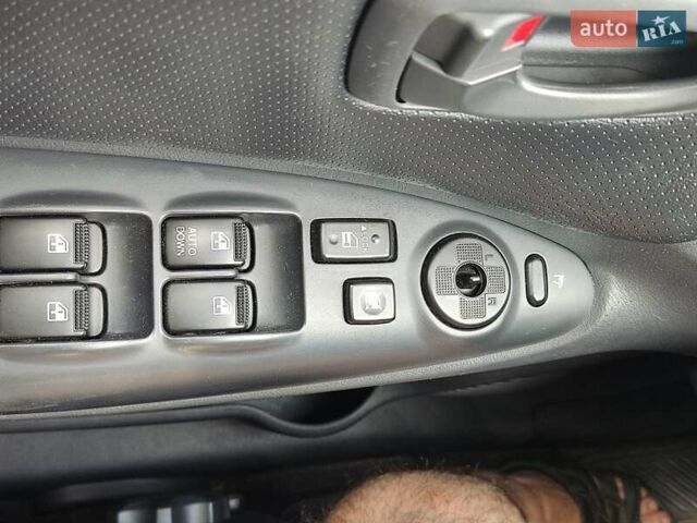 Чорний Хендай Туксон, об'ємом двигуна 1.98 л та пробігом 145 тис. км за 10000 $, фото 11 на Automoto.ua