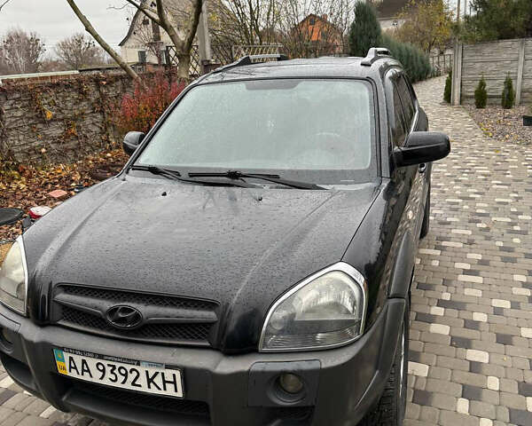 Черный Хендай Туксон, объемом двигателя 2.66 л и пробегом 205 тыс. км за 10000 $, фото 31 на Automoto.ua