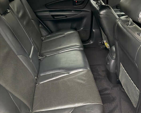 Черный Хендай Туксон, объемом двигателя 2.66 л и пробегом 205 тыс. км за 10000 $, фото 65 на Automoto.ua