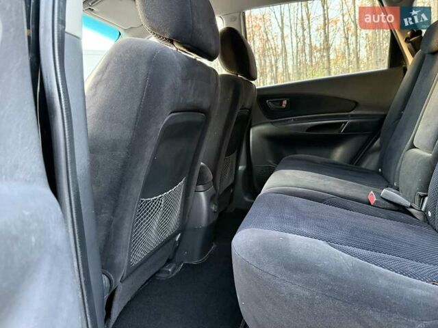 Черный Хендай Туксон, объемом двигателя 2 л и пробегом 148 тыс. км за 8700 $, фото 18 на Automoto.ua