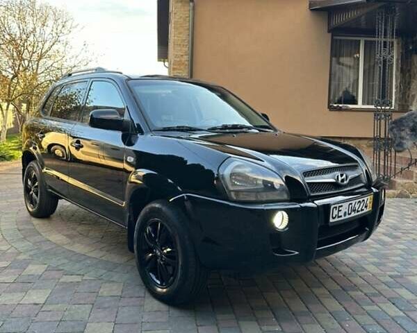 Черный Хендай Туксон, объемом двигателя 1.98 л и пробегом 198 тыс. км за 8250 $, фото 8 на Automoto.ua