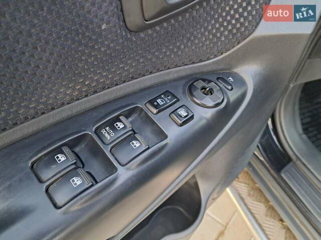 Черный Хендай Туксон, объемом двигателя 1.98 л и пробегом 233 тыс. км за 7850 $, фото 7 на Automoto.ua