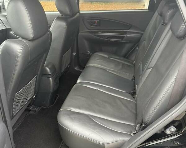 Черный Хендай Туксон, объемом двигателя 2 л и пробегом 237 тыс. км за 8350 $, фото 21 на Automoto.ua