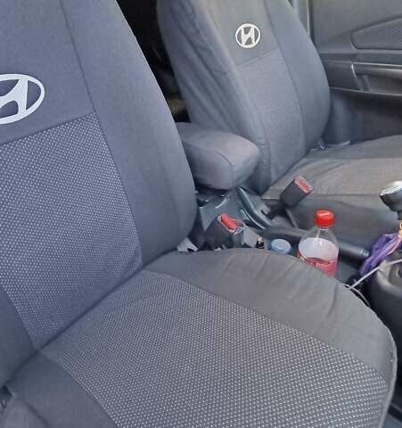 Черный Хендай Туксон, объемом двигателя 2 л и пробегом 226 тыс. км за 8700 $, фото 6 на Automoto.ua