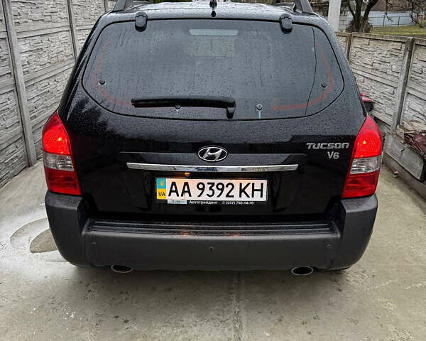 Черный Хендай Туксон, объемом двигателя 2.66 л и пробегом 205 тыс. км за 10000 $, фото 23 на Automoto.ua