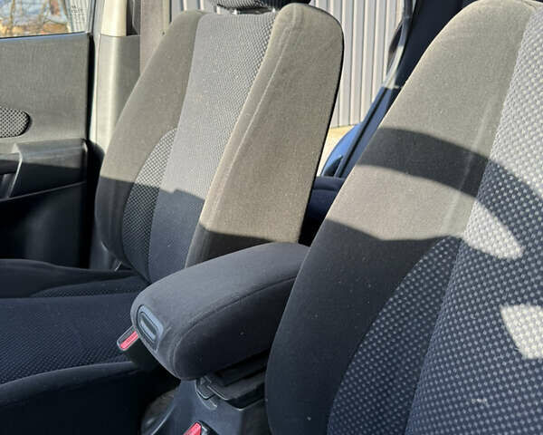 Черный Хендай Туксон, объемом двигателя 1.98 л и пробегом 220 тыс. км за 7500 $, фото 14 на Automoto.ua