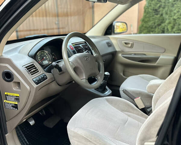 Хендай Туксон 2009 в Калуше на Automoto.ua Черный Хендай Туксон, объемом двигателя 1.98 л и пробегом 198 тыс. км за 7500 $, фото 22 на Automoto.ua