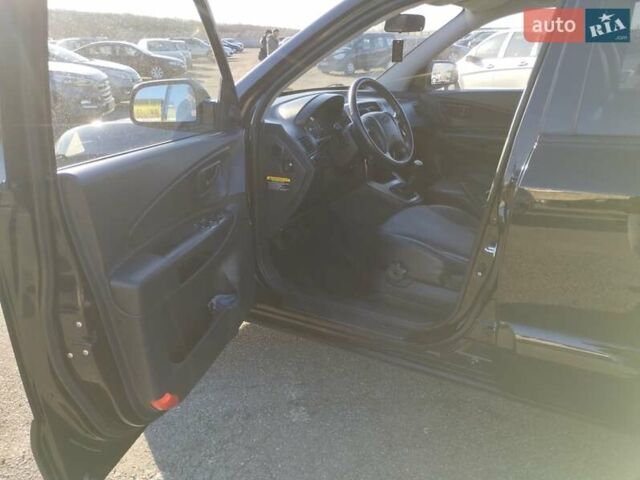 Черный Хендай Туксон, объемом двигателя 1.99 л и пробегом 159 тыс. км за 9700 $, фото 23 на Automoto.ua