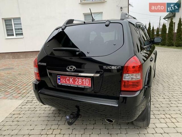 Черный Хендай Туксон, объемом двигателя 2 л и пробегом 114 тыс. км за 8850 $, фото 9 на Automoto.ua