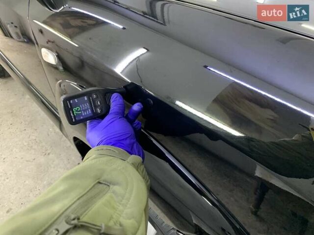 Черный Хендай Туксон, объемом двигателя 2 л и пробегом 114 тыс. км за 8850 $, фото 77 на Automoto.ua