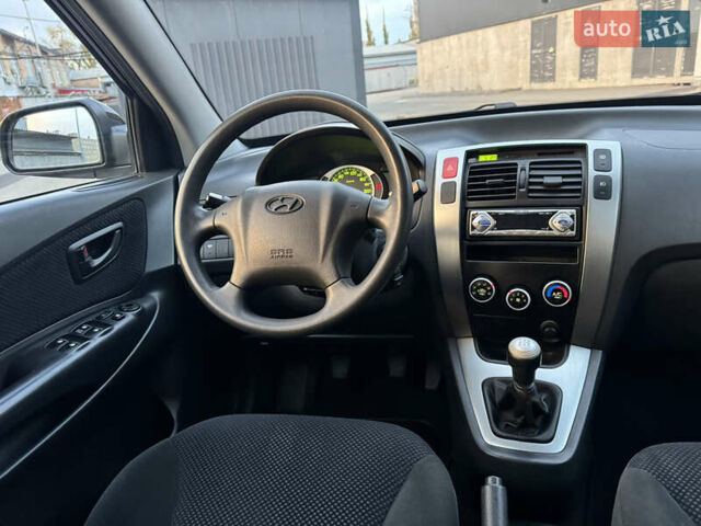 Хендай Туксон 2009 в Киеве на Automoto.ua Черный Хендай Туксон, объемом двигателя 2 л и пробегом 110 тыс. км за 8700 $, фото 29 на Automoto.ua