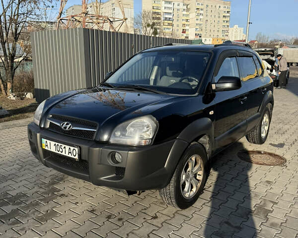 Черный Хендай Туксон, объемом двигателя 1.98 л и пробегом 220 тыс. км за 7500 $, фото 6 на Automoto.ua