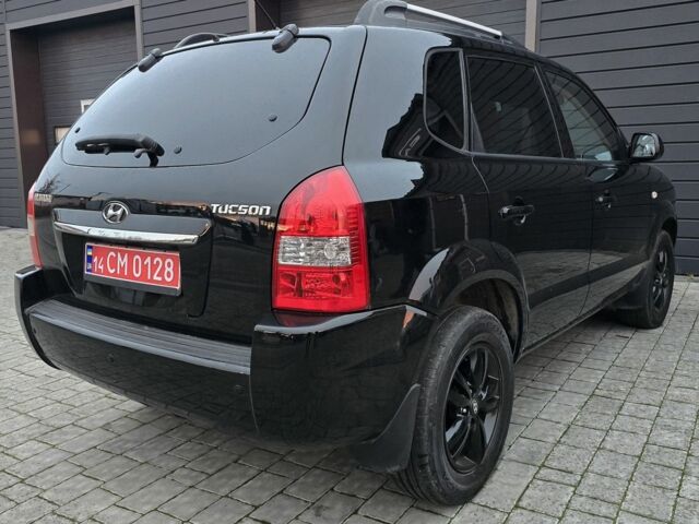Черный Хендай Туксон, объемом двигателя 2 л и пробегом 198 тыс. км за 7999 $, фото 1 на Automoto.ua