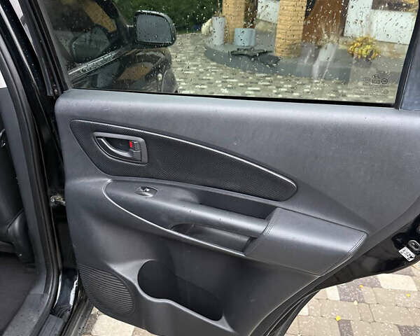 Черный Хендай Туксон, объемом двигателя 2.66 л и пробегом 205 тыс. км за 10000 $, фото 74 на Automoto.ua