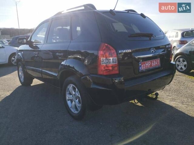 Черный Хендай Туксон, объемом двигателя 1.99 л и пробегом 159 тыс. км за 9700 $, фото 24 на Automoto.ua