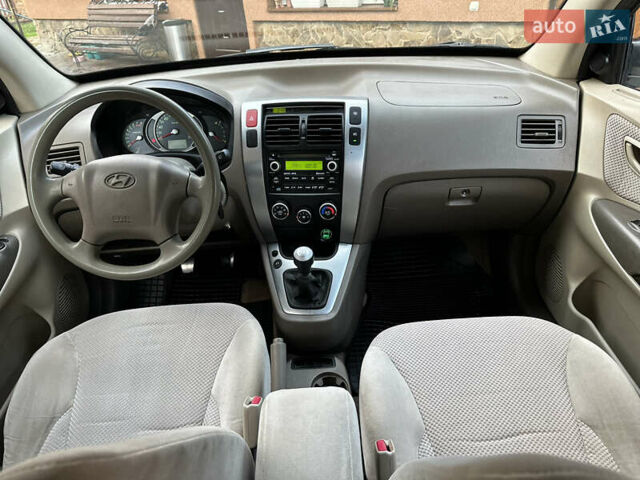 Хендай Туксон 2009 в Калуше на Automoto.ua Черный Хендай Туксон, объемом двигателя 1.98 л и пробегом 198 тыс. км за 7500 $, фото 37 на Automoto.ua