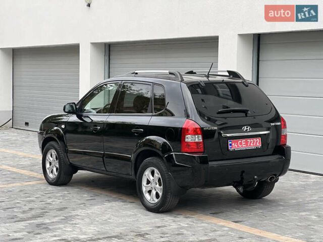 Чорний Хендай Туксон, об'ємом двигуна 2 л та пробігом 163 тис. км за 9199 $, фото 7 на Automoto.ua