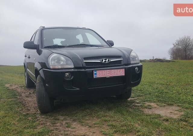 Черный Хендай Туксон, объемом двигателя 2 л и пробегом 198 тыс. км за 8200 $, фото 1 на Automoto.ua