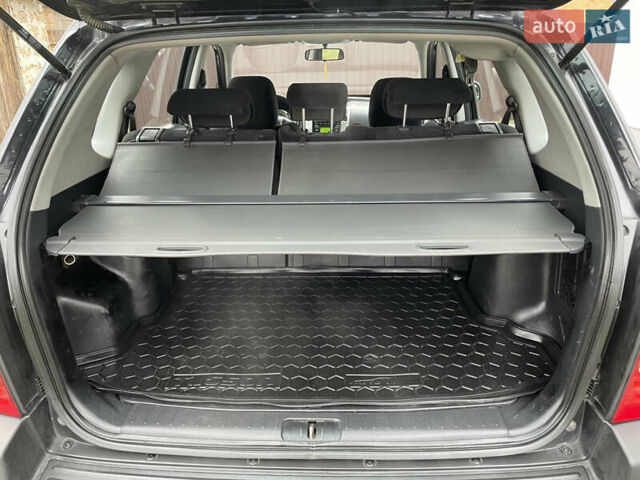 Чорний Хендай Туксон, об'ємом двигуна 2 л та пробігом 200 тис. км за 8450 $, фото 33 на Automoto.ua