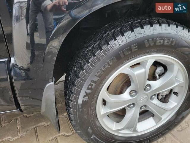 Черный Хендай Туксон, объемом двигателя 2 л и пробегом 194 тыс. км за 9100 $, фото 9 на Automoto.ua