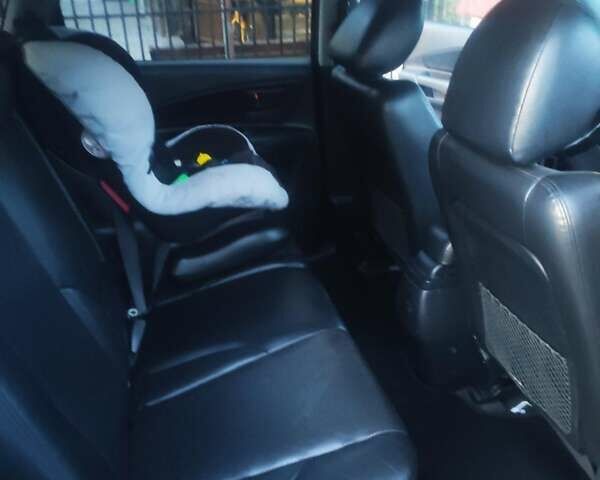 Черный Хендай Туксон, объемом двигателя 2 л и пробегом 271 тыс. км за 7777 $, фото 6 на Automoto.ua
