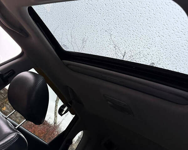 Черный Хендай Туксон, объемом двигателя 2.66 л и пробегом 205 тыс. км за 10000 $, фото 21 на Automoto.ua