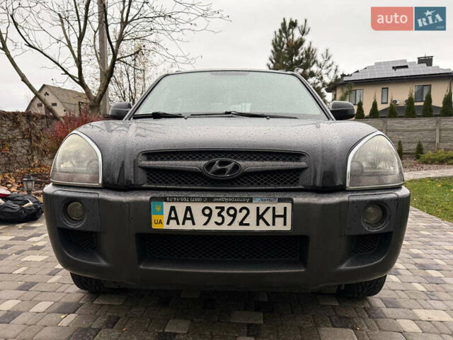 Черный Хендай Туксон, объемом двигателя 2.66 л и пробегом 205 тыс. км за 10000 $, фото 57 на Automoto.ua