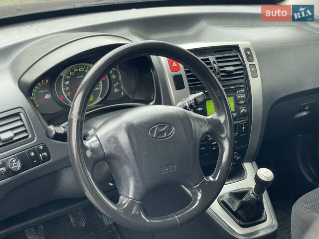 Чорний Хендай Туксон, об'ємом двигуна 2 л та пробігом 200 тис. км за 8450 $, фото 24 на Automoto.ua