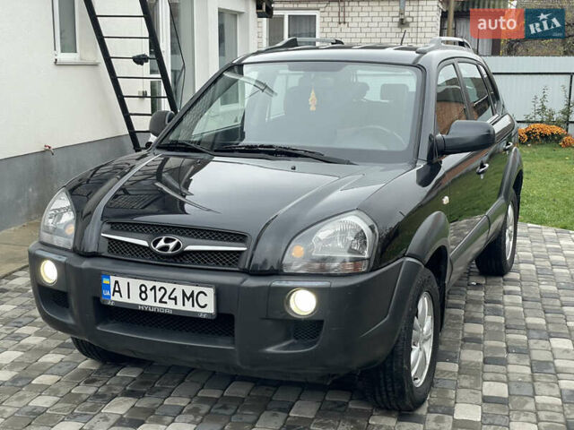 Чорний Хендай Туксон, об'ємом двигуна 2 л та пробігом 200 тис. км за 8450 $, фото 13 на Automoto.ua