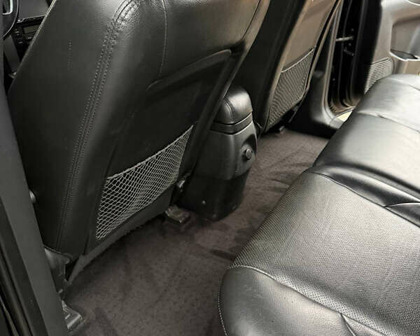 Черный Хендай Туксон, объемом двигателя 2.66 л и пробегом 205 тыс. км за 10000 $, фото 51 на Automoto.ua