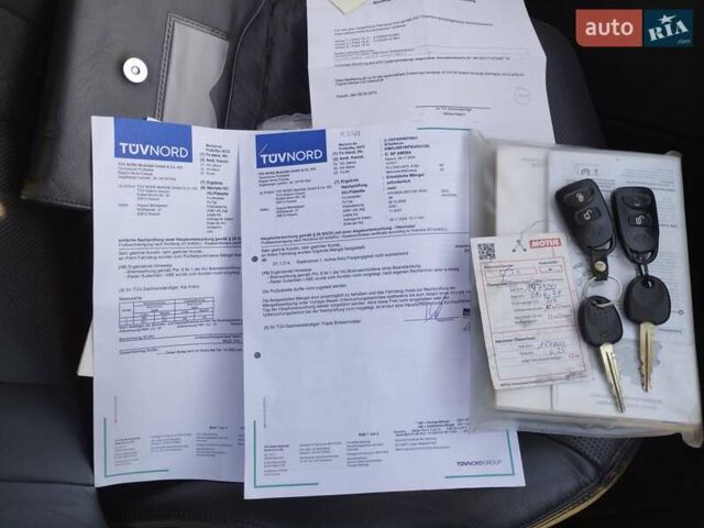 Черный Хендай Туксон, объемом двигателя 1.99 л и пробегом 159 тыс. км за 9700 $, фото 2 на Automoto.ua