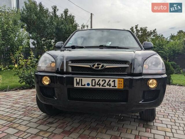 Чорний Хендай Туксон, об'ємом двигуна 2 л та пробігом 217 тис. км за 7700 $, фото 6 на Automoto.ua