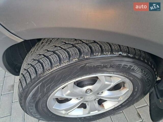 Черный Хендай Туксон, объемом двигателя 1.98 л и пробегом 233 тыс. км за 7850 $, фото 18 на Automoto.ua