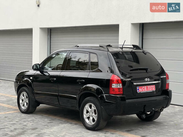 Чорний Хендай Туксон, об'ємом двигуна 2 л та пробігом 163 тис. км за 9199 $, фото 15 на Automoto.ua